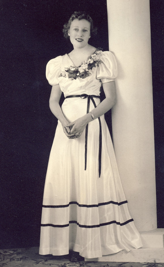 1930s vintage photo of a young woman in a 1930s Prom dress worn by a young woman