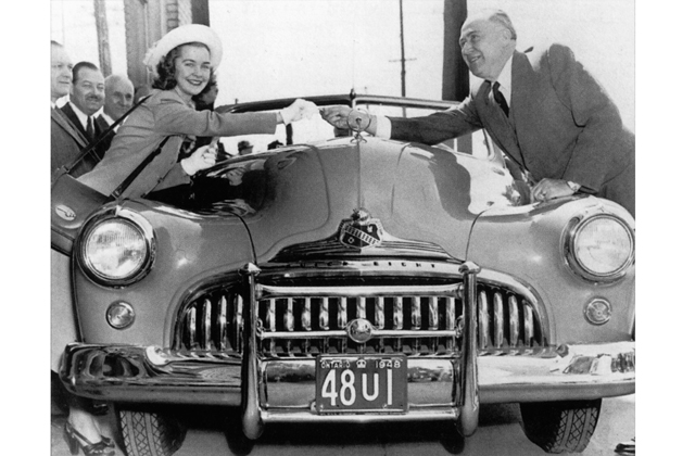 1940s vintage photo of Barbara Ann Scott Figure Skater at her parade after winning gold at the Olympics. Parade is in Ottawa. 