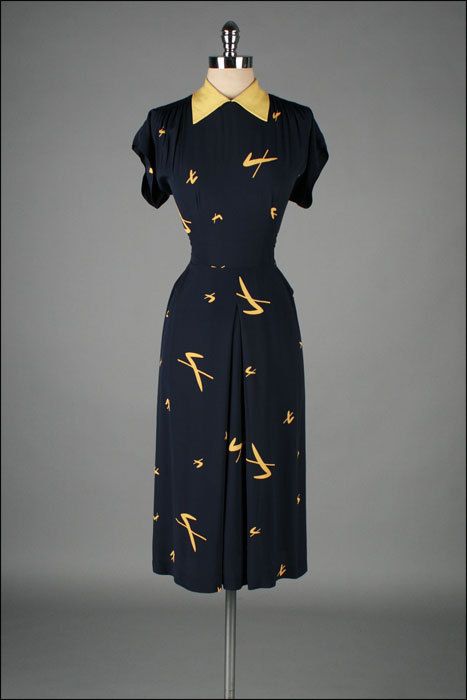 1940s vintage Rayon Dress with a novelty print, yellow and black. 