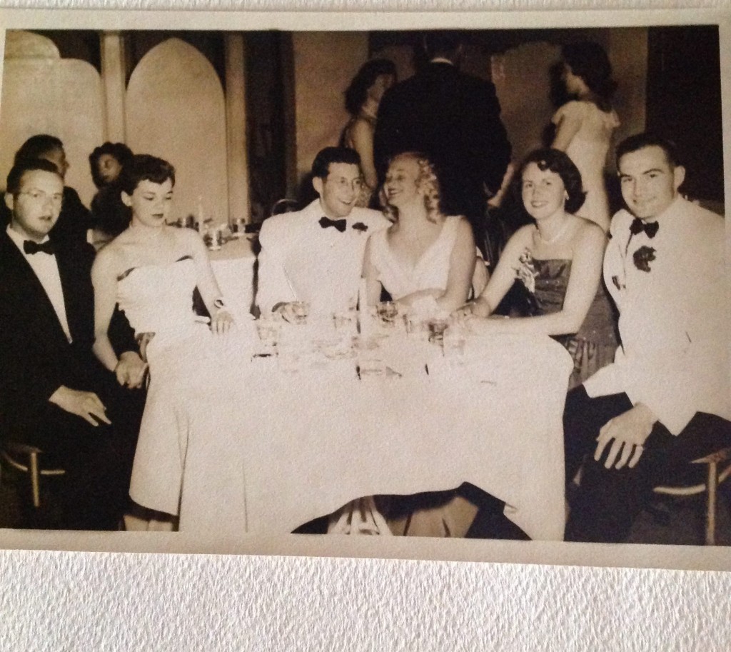 1950s photo of young men and women at a party