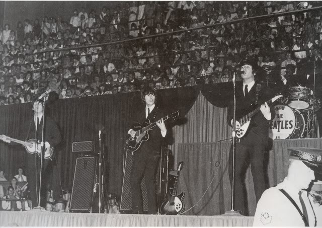 1960s vintage photo of the Beatles at maple leaf Gardensn 1965