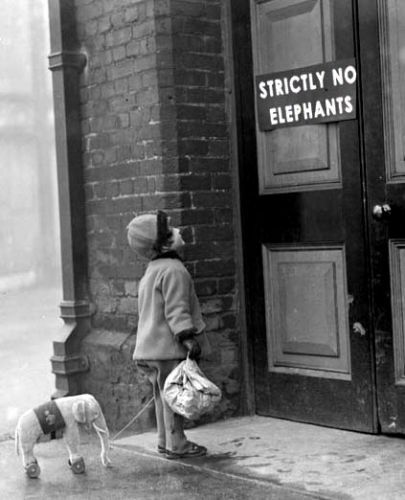 1927 vintage image of a child and her toy