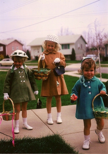 1950s/ 1960s Vintage Photo: Nothing to see here but cute Easter bonnets and really fantastic coats. I also adore the older girls purse that she is carrying. Such style at such a young age.