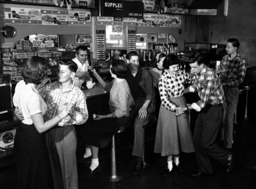 1950s Teenagers dancing in a soda malt shop