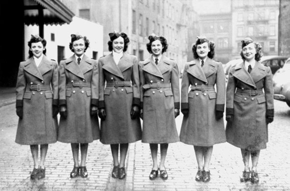 1940s vintage photo of TorontoTTC women workers in their uniforms. 