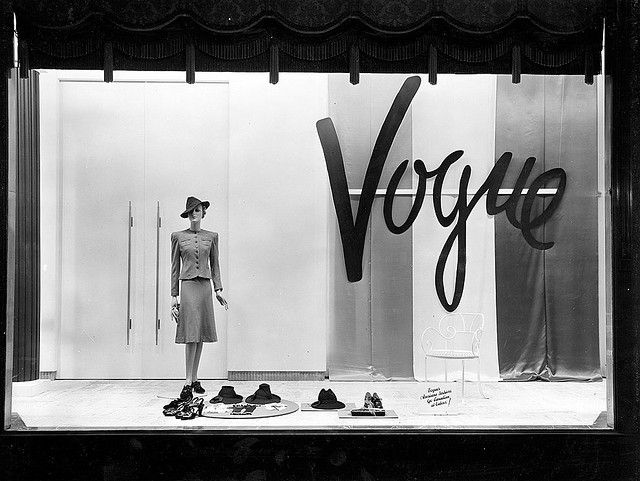 1940s Toronto storefront window for Vogue designs. The window features a women's 1940s two piece suit. 