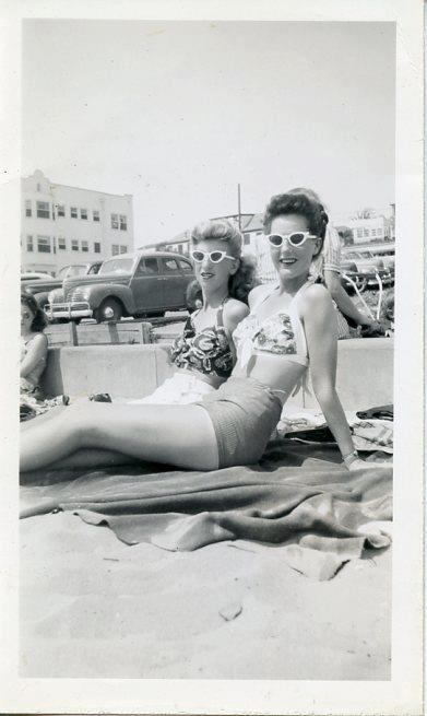 1940s Vintage Photo: Need a vintage beach look for your summer pool parties? These ladies have it down pat. Look at those cool 1940s sunglasses and the fun 1940s hairstyles and their two piece outfits are so cute!