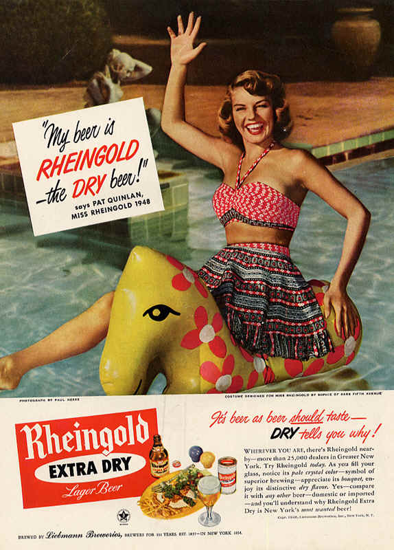 1940s vintage ad for rheingold beer featuring "Pat Quinlan, Miss Rheingold 1948". Pat is on a blow up animal in the pool wearing a two piece swimsuit. 