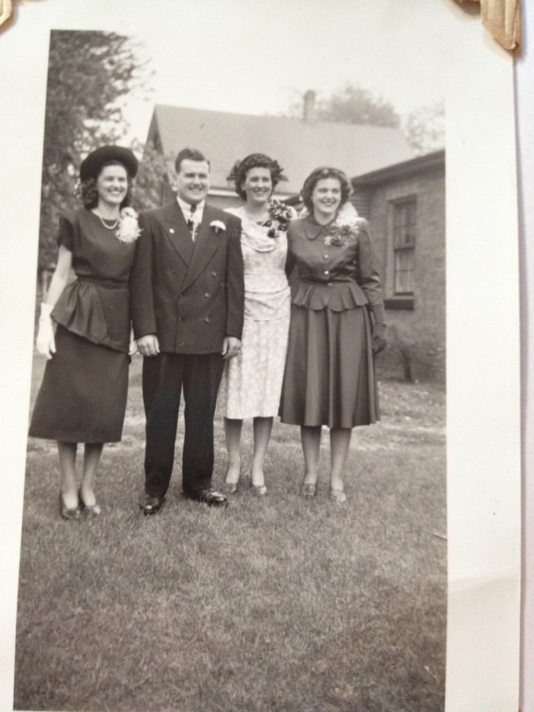 Late 1940s vintage photo of the Vintage Inn Blog's grandfather and his sisters in stylish late 1940s clothes.