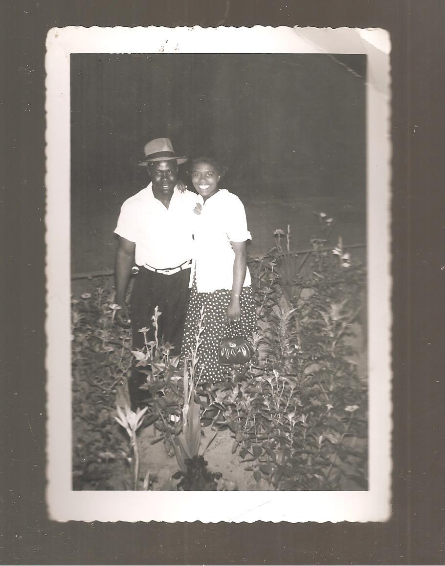 1950s Vintage Photo of a Black Couple posing in a garden together. 