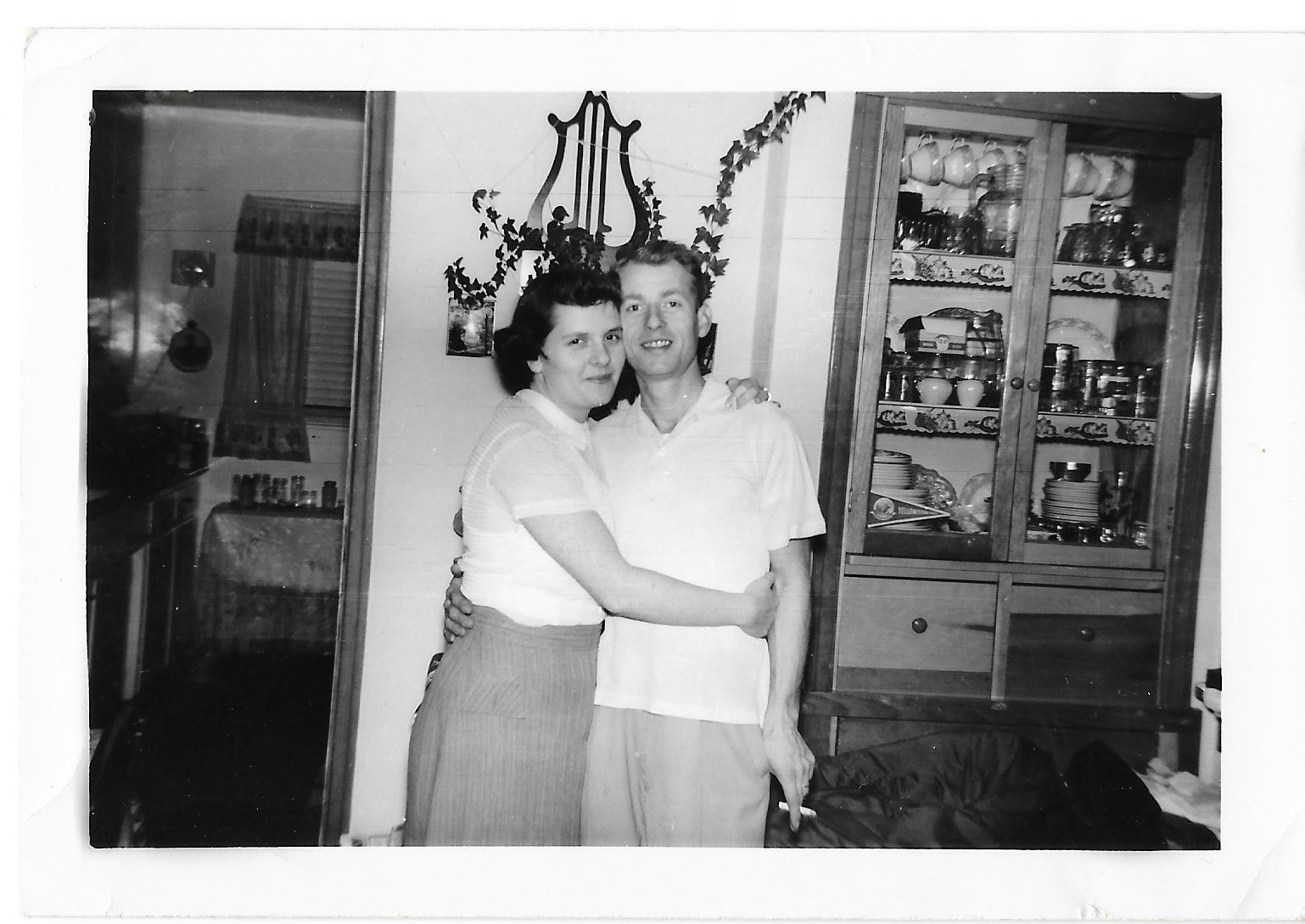 1950s Vintage Photo of a couple in their 1950s Living Room. 