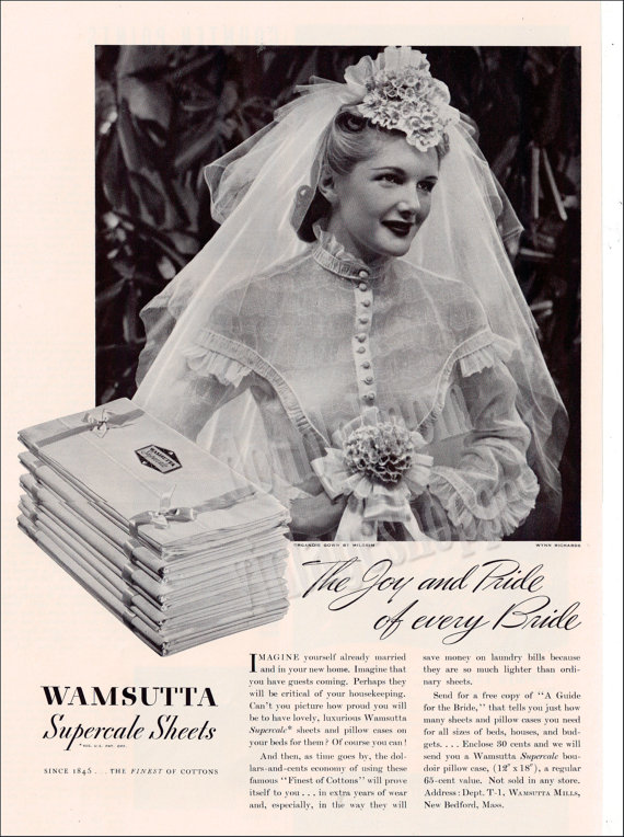 1940s vintage ad for sheets featuring a bride in her wedding dress and 1940s hairstyle. 