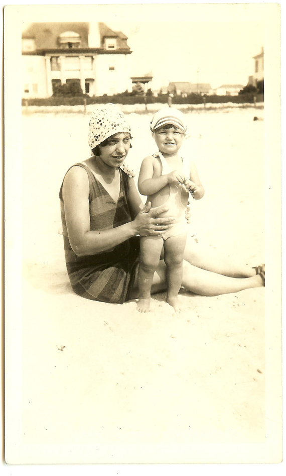 1920s vintage photo of mom and child in swimsuits at beach