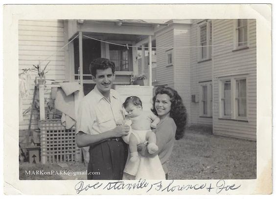 1940s Vintage Image of husband and wife with baby. 