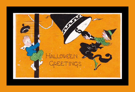 1920s vintage postcard for Halloween Greetings featuring a witch ringing a bell. 