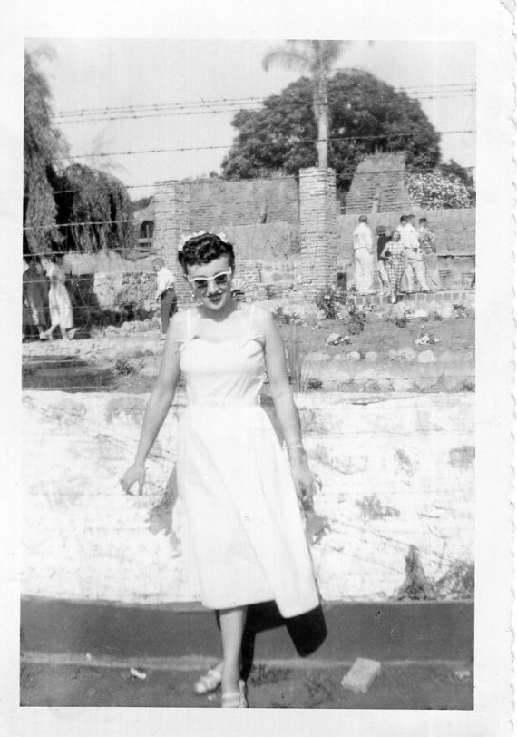 1950s Photo of a woman in mexico in a 1950s sundress.