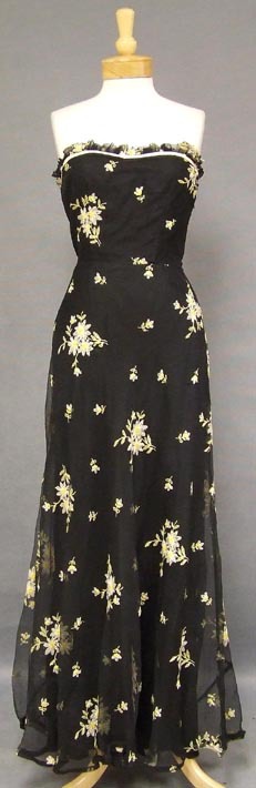 1940s Fashion: an embroidered marquisette 1940s evening gown. 