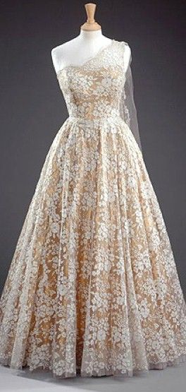 1940s fashion: A Norman Hartnell Gold tissue dress