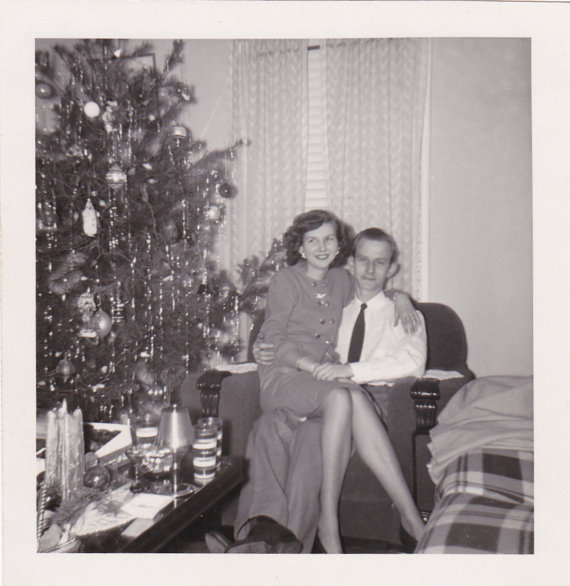 Christmas with my sweetheart -1940s vintage photo of a couple posing together for a photo. 