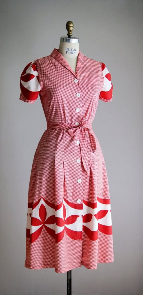 1940s vintage day dress in red & white with a cute print. 