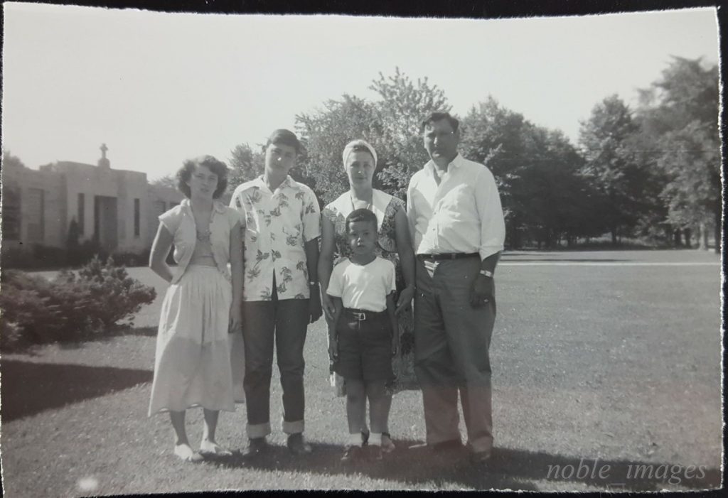 1940s vintage photo of a family Paying a visit to Cleveland Park, 1940's. Super 1940s fashions. 