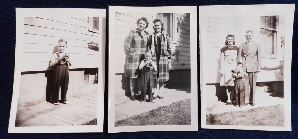 1940s family with little boy and horn. A 1940s vintage image