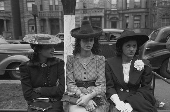 1940s vintage photo of 3 stylish Black women in 1940s hats and 1940s outfits. 