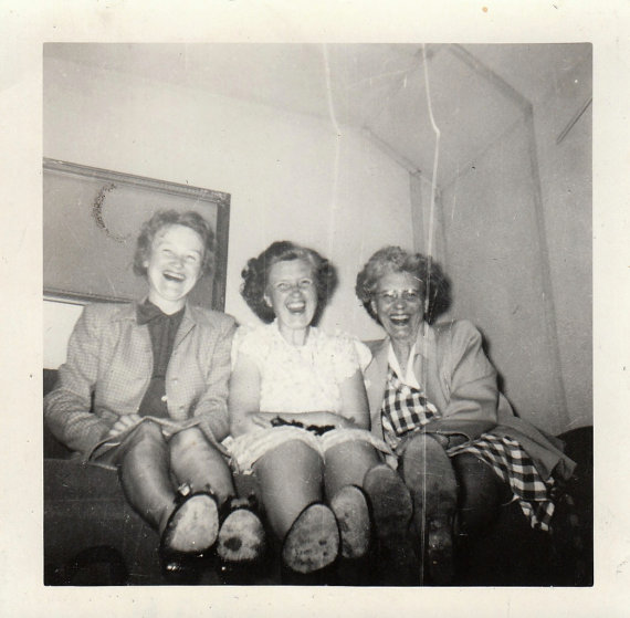 1940's vintage image of older women laughing together. 