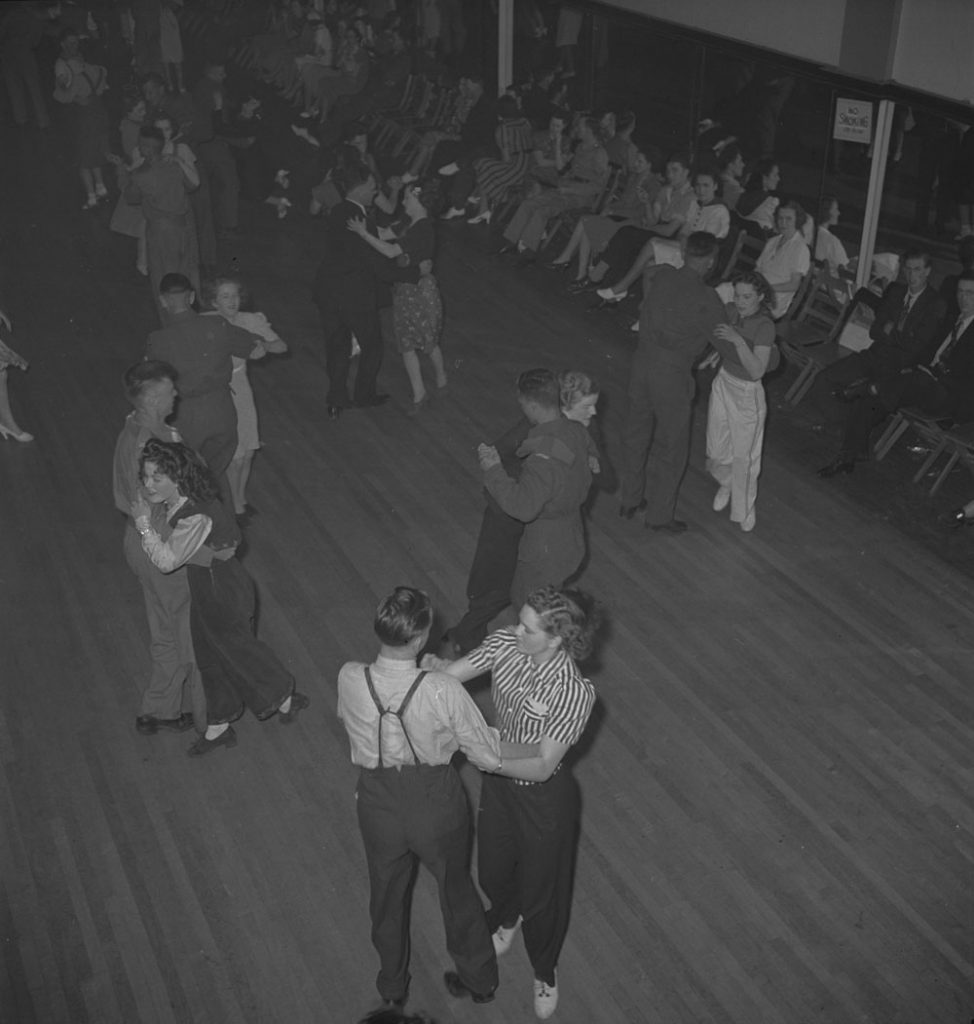 1940s vintage image: 1940's social dance, view of the busy dance floor.