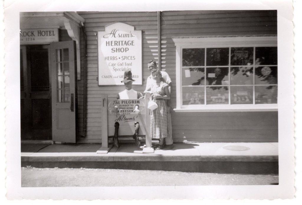 1950s vacation photos of a couple at a shop vintage