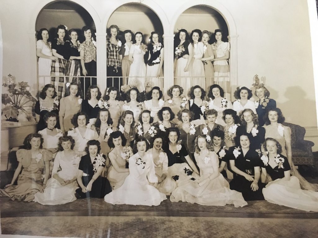 1940's vintage image of girls all dressed up for a dance