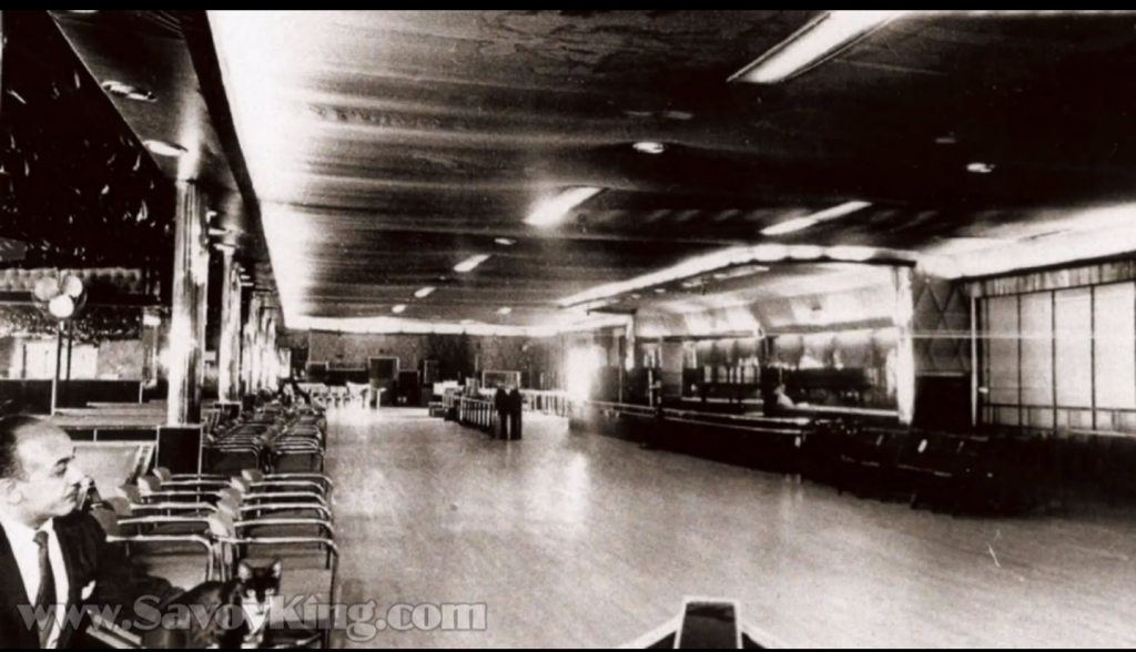 Vintage Photo of the inside of the Savoy Ballroom showing the famous dance floor and where the bands played. 