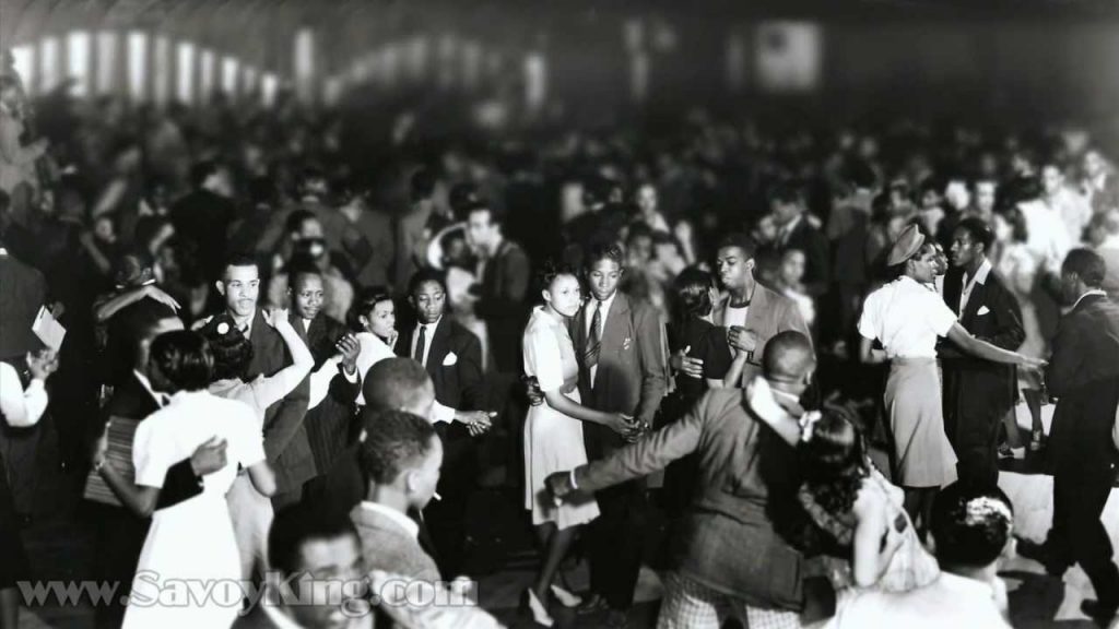 1940s vintage photo of Lindy Hoppers dancing at the savoy ballroom in Harlem, New York