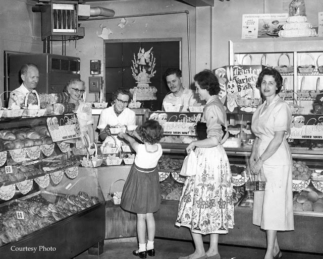 1950s photo of a bakery selling easter goods vintage image