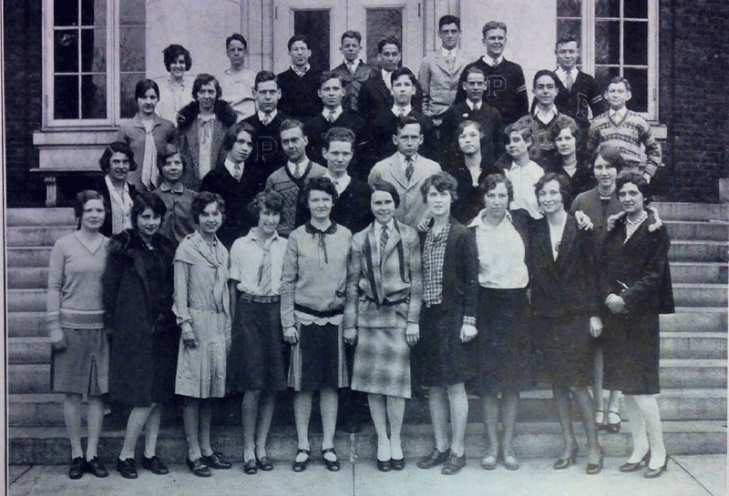 1920s Photo:1928 photograph of the cinema club, fun 1920s fashions on display for men and women. 