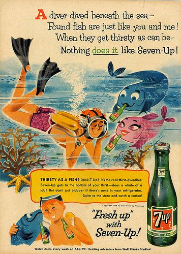 1950's vintage Sevenup ad featuring a scuba diver with cute fish. 