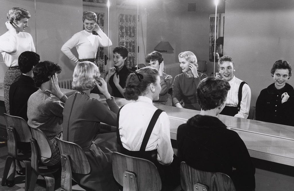 1950s Vintage photo: Members of the Fashion Club at University of Wisconsin get ready before before a show (1950-1959). 1950s Hairstyles & 1950s fashions.