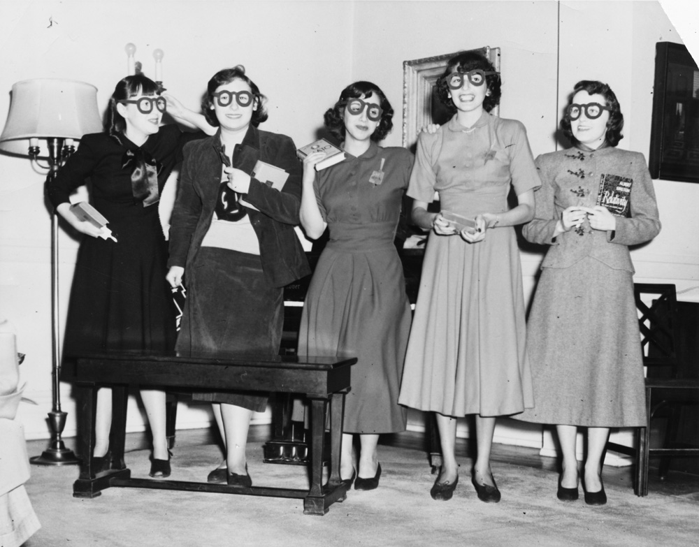 University of Chicago Student Group vintage image from the 1940s. The women are wearing 1940s fashions and 1940s hairstyles. 