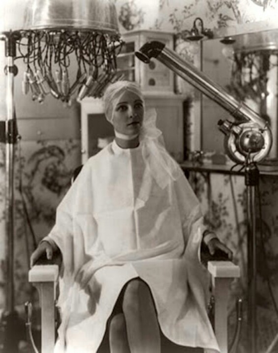 1920s woman having hair dried vintage image