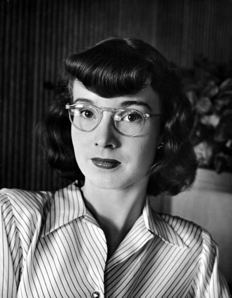 1945 life magazine image of young woman wearing glasses