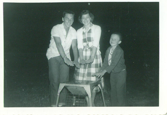 1950s Vintage Photo: Happy Family Warming Hands Over Grill a 1950s Summer Picnic