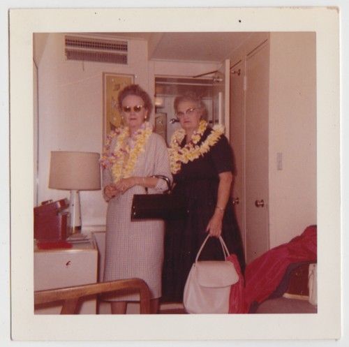 1960s mature women wearing leis hawaiian vacation vintage image