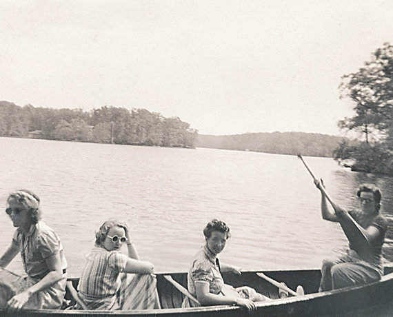 1930s Vintage Photograph of Women Friends Boating In Canoe. Super 1930s sunglasses and 1930s hairstyles. 