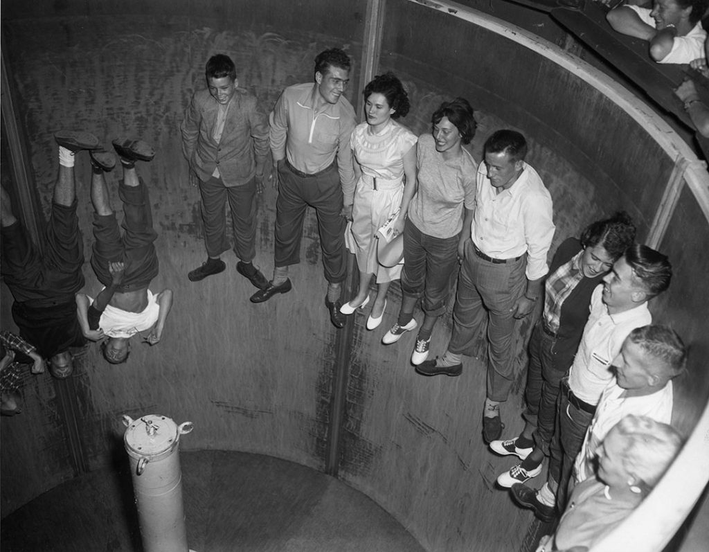 Defying Gravity in the Rotor! 1953 vintage photo of a carnival ride at the CNE. 