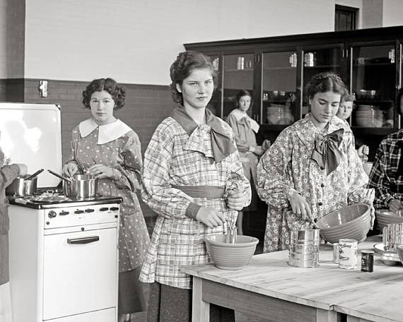 Cooking Class, 1935. Vintage Photo featuring a group of young woman learning to cook.