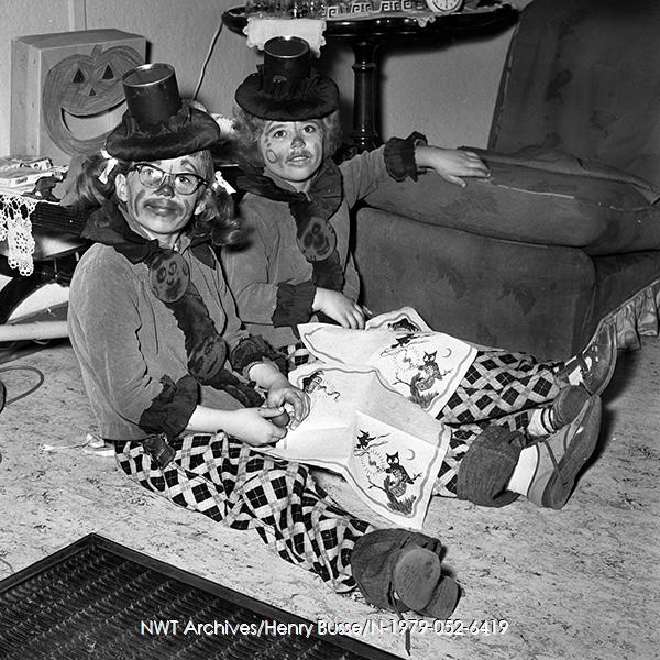 1950s vintage photo of a 1955 vintage halloween photo of 2 little girls dressed as clowns