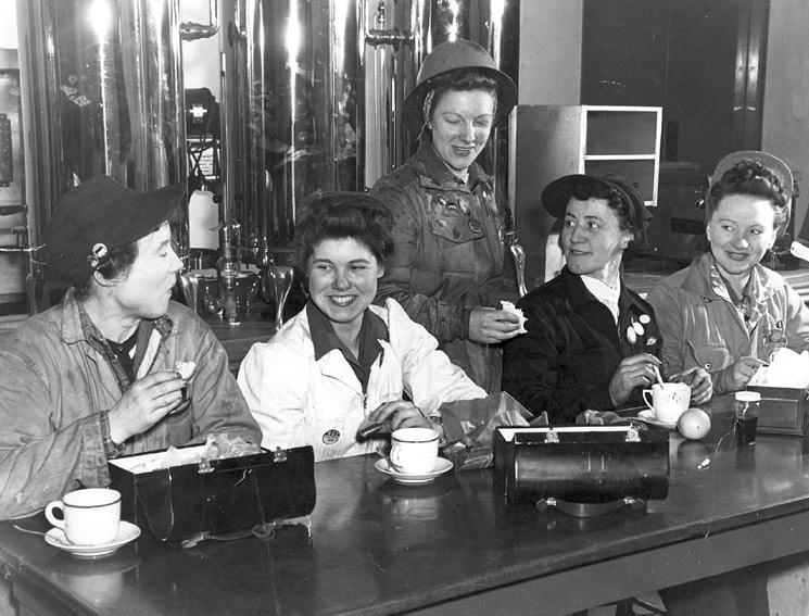 1940s Vintage Photo of Canadian Women taking a break from their shift from working at the Shipyard for the WW2 Canadian Home Front effort. 1942 Photo.