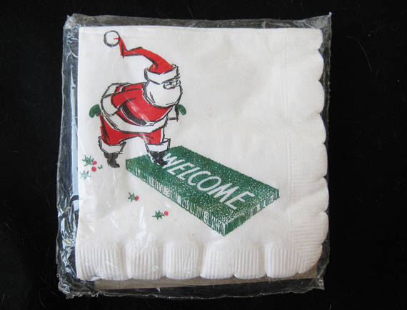 1950s paper napkins featuring Santa walking on a welcome mat.