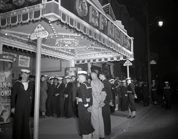 1940s vintage photo of Service personnel and civilans at Orpheus movie theatre Barrington Street, Halifax