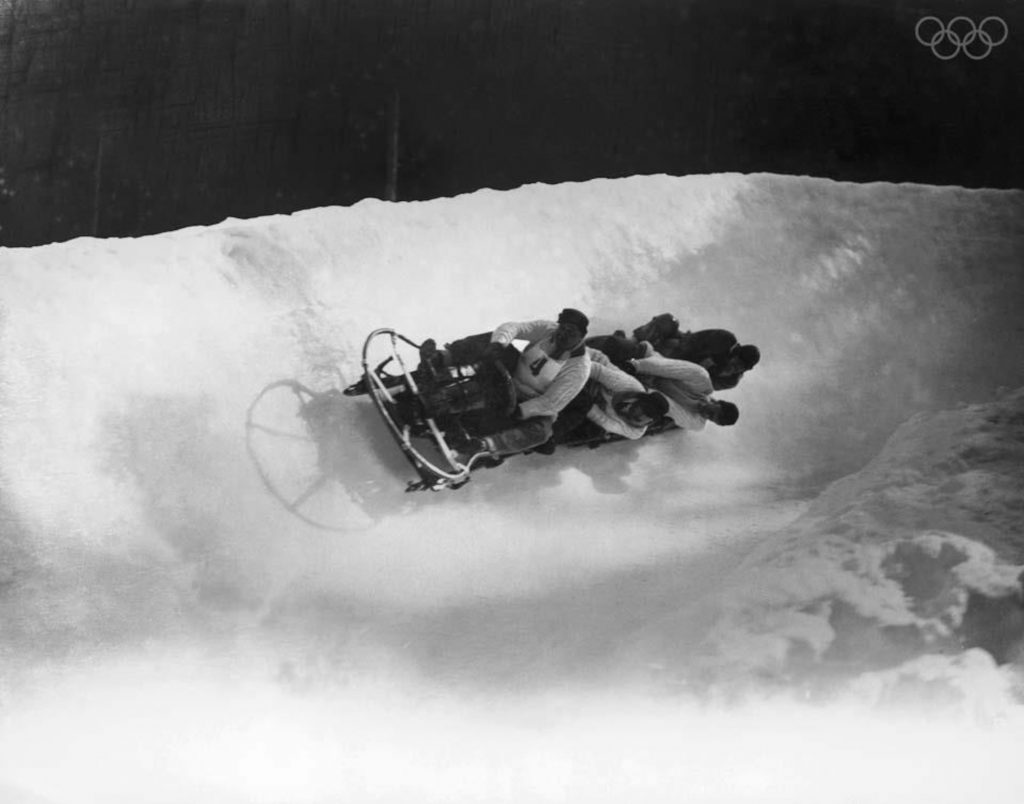 1920s Vintage Photo: The British four-man bobsleigh team in action at the Winter Olympics at Chamonix, February 1924.